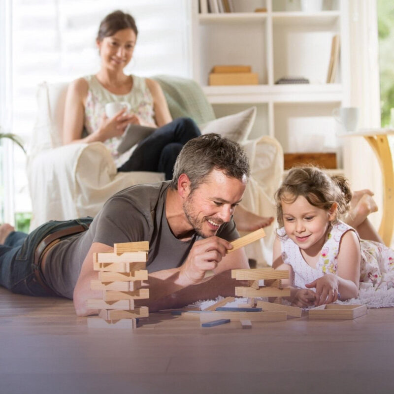 Family playing on floor-edit Family playing on floor-edit